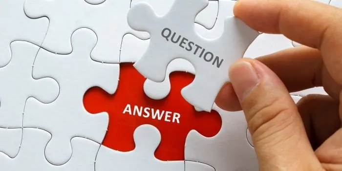 Puzzle pieces with question and answer